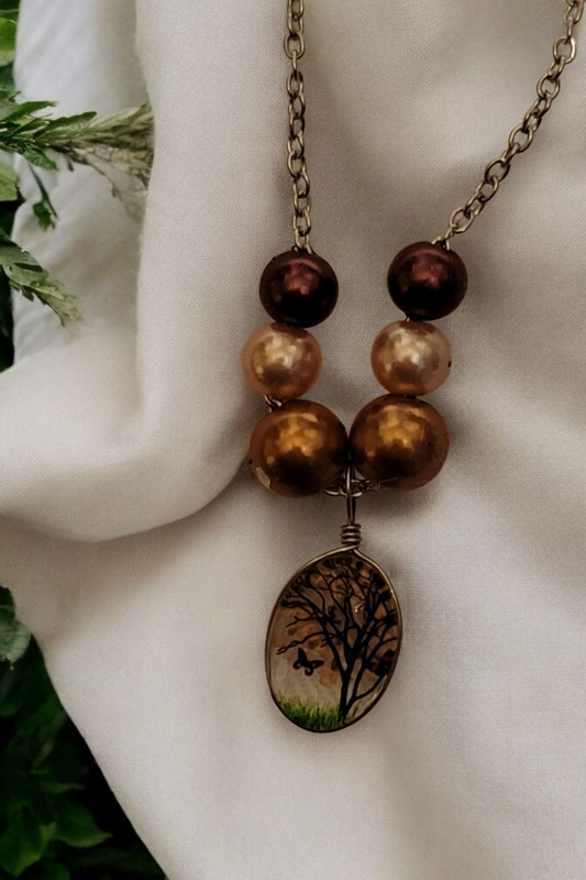 16" resin tree with earthtone pearl necklace