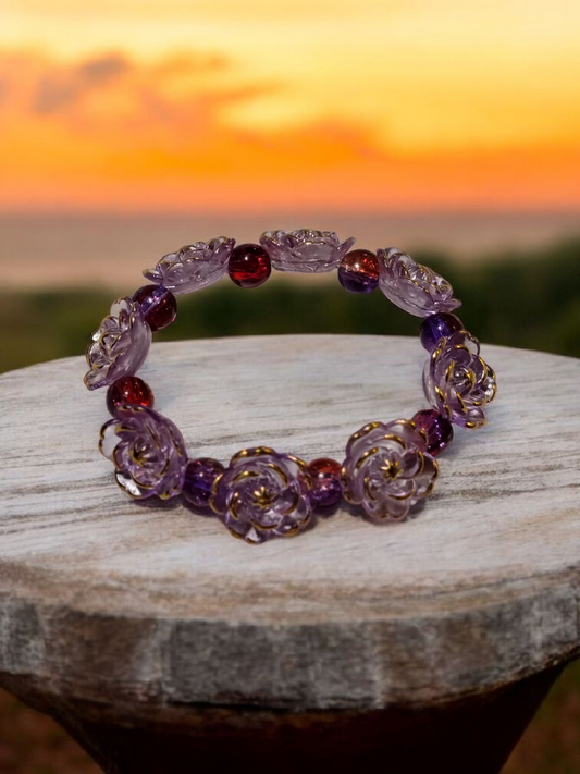 Purple floral bracelet. Fits 7"wrist.